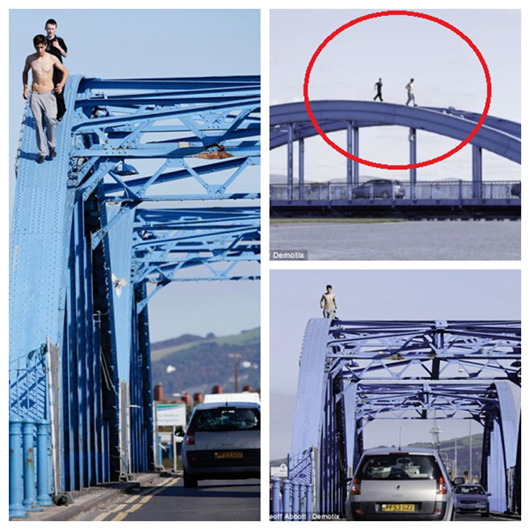 英国两少年高架桥顶“玩命路跑”民众傻眼（图）