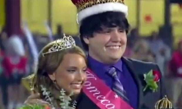 Hailie Mathers with a classmate crowned homecoming king