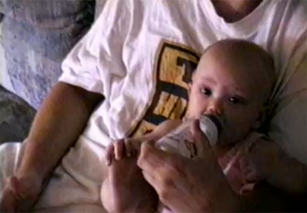 Hailie on her dad\'s lap in Mockingbird video