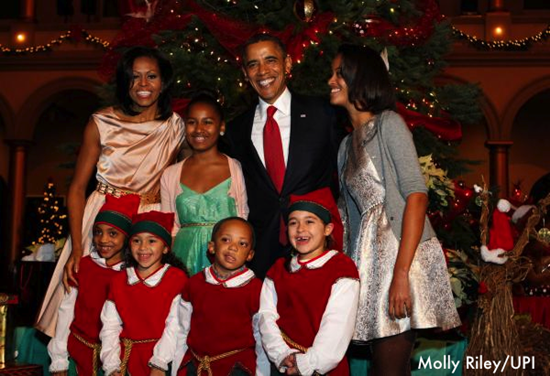 奥巴马一家参加慈善演唱会感受圣诞气氛（图）
